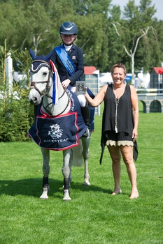 Izabella Rogers takes The Les Squibb Winter 128cms Championship at Hickstead’s BHS Royal International Horse Show
